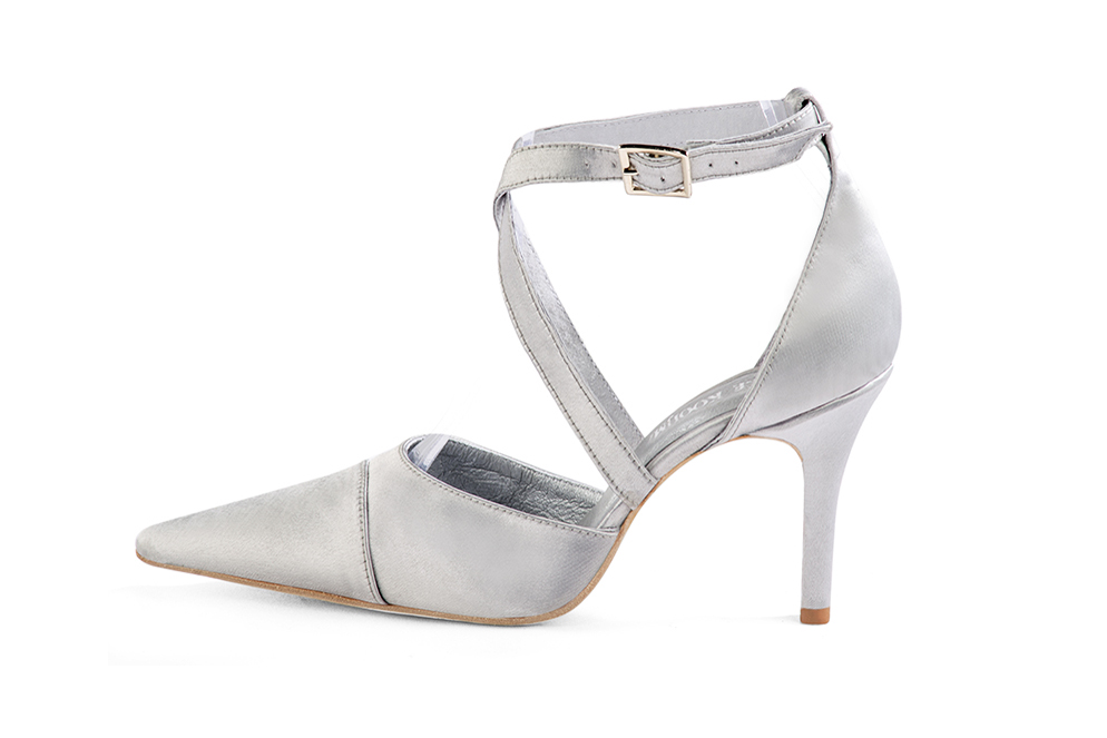 French elegance and refinement for these light silver dress open side shoes, with crossed straps, 
                available in many subtle leather and colour combinations. This charming satin model will give a princess look to your wedding dress.
Its adjustable crossed straps will sublimate your foot.  
                Matching clutches for parties, ceremonies and weddings.   
                You can customize these shoes to perfectly match your tastes or needs, and have a unique model.  
                Choice of leathers, colours, knots and heels. 
                Wide range of materials and shades carefully chosen.  
                Rich collection of flat, low, mid and high heels.  
                Small and large shoe sizes - Florence KOOIJMAN